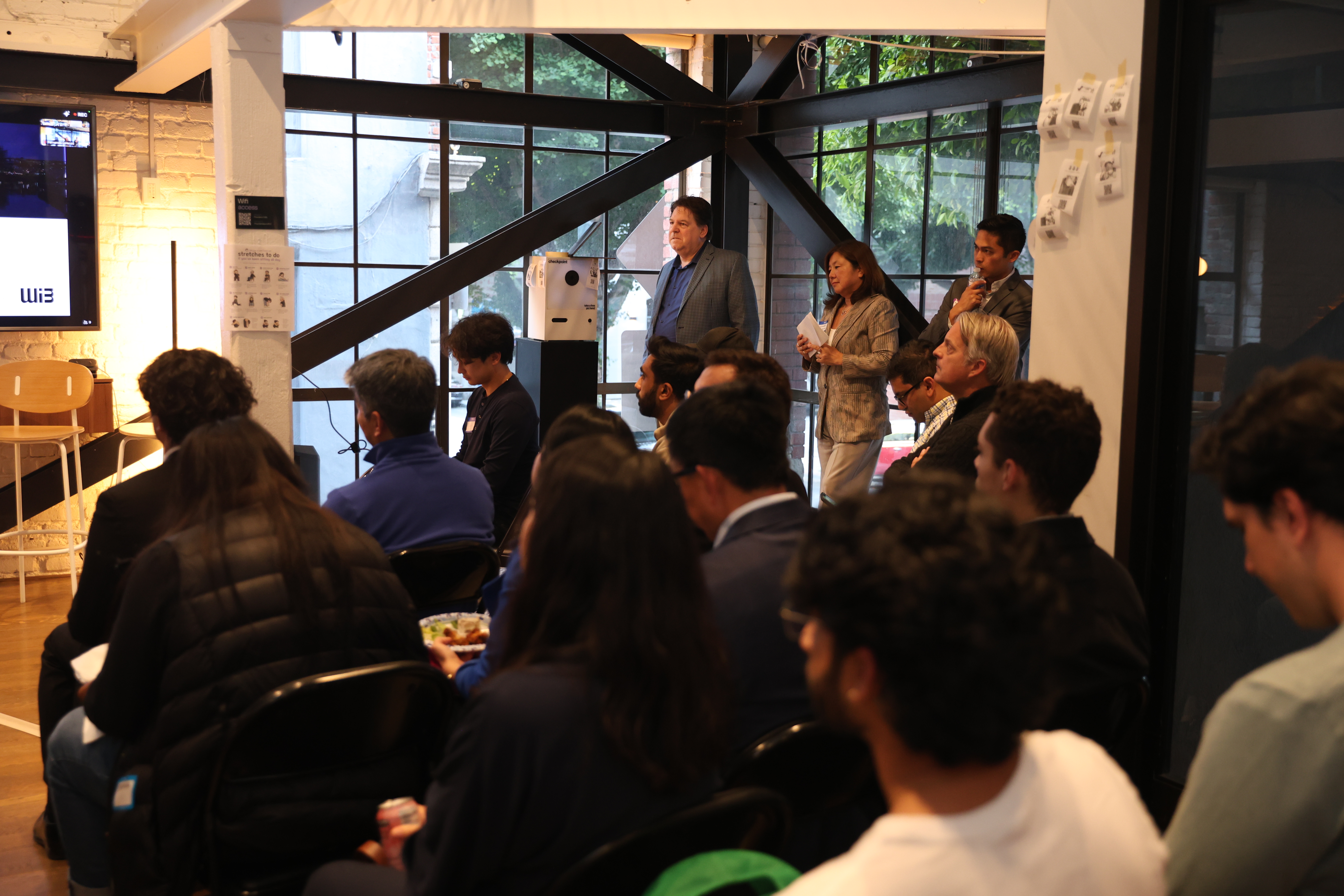 Community members arriving at a startup gathering