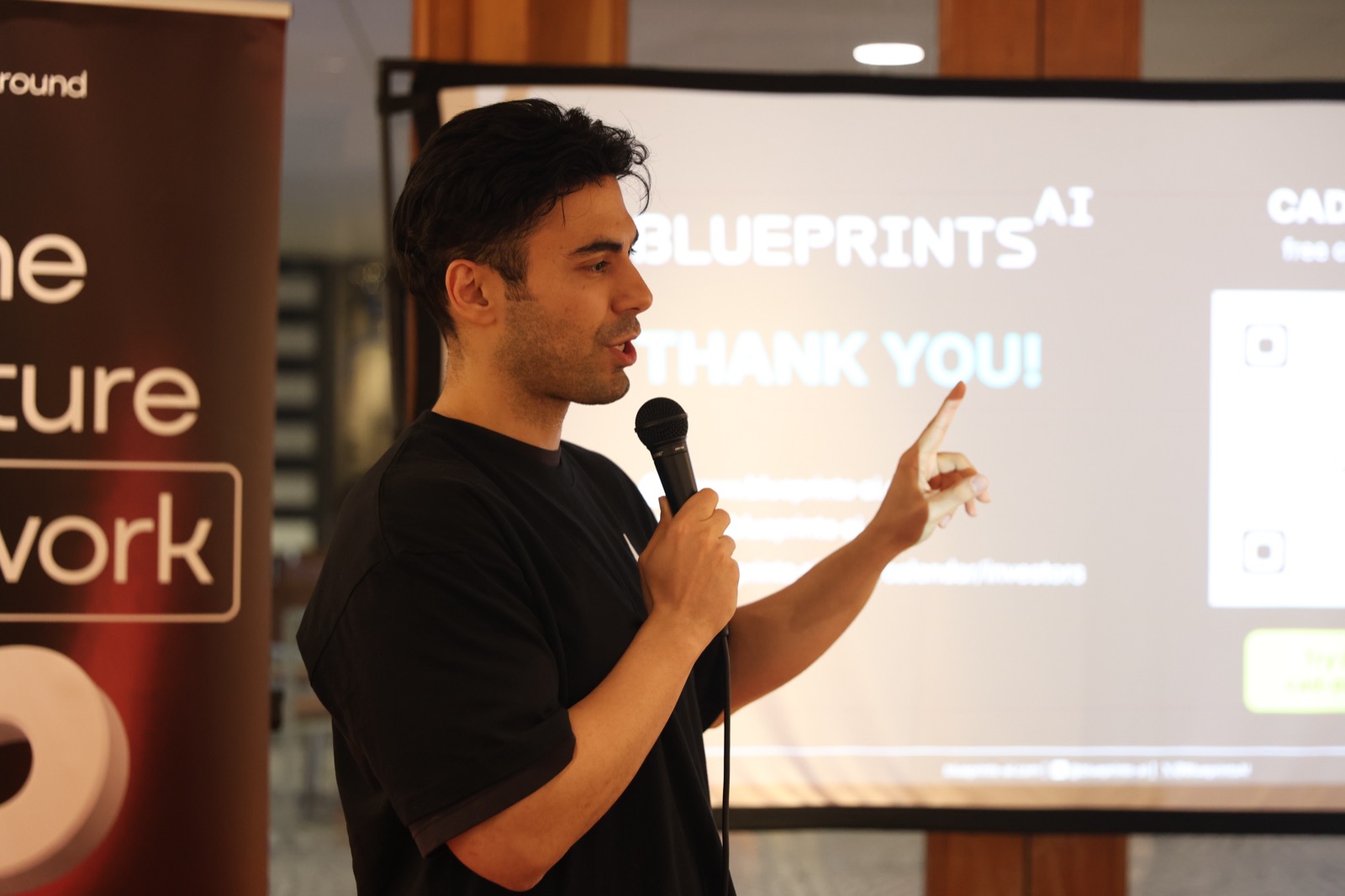 Blueprints AI founder presenting at a pitch event