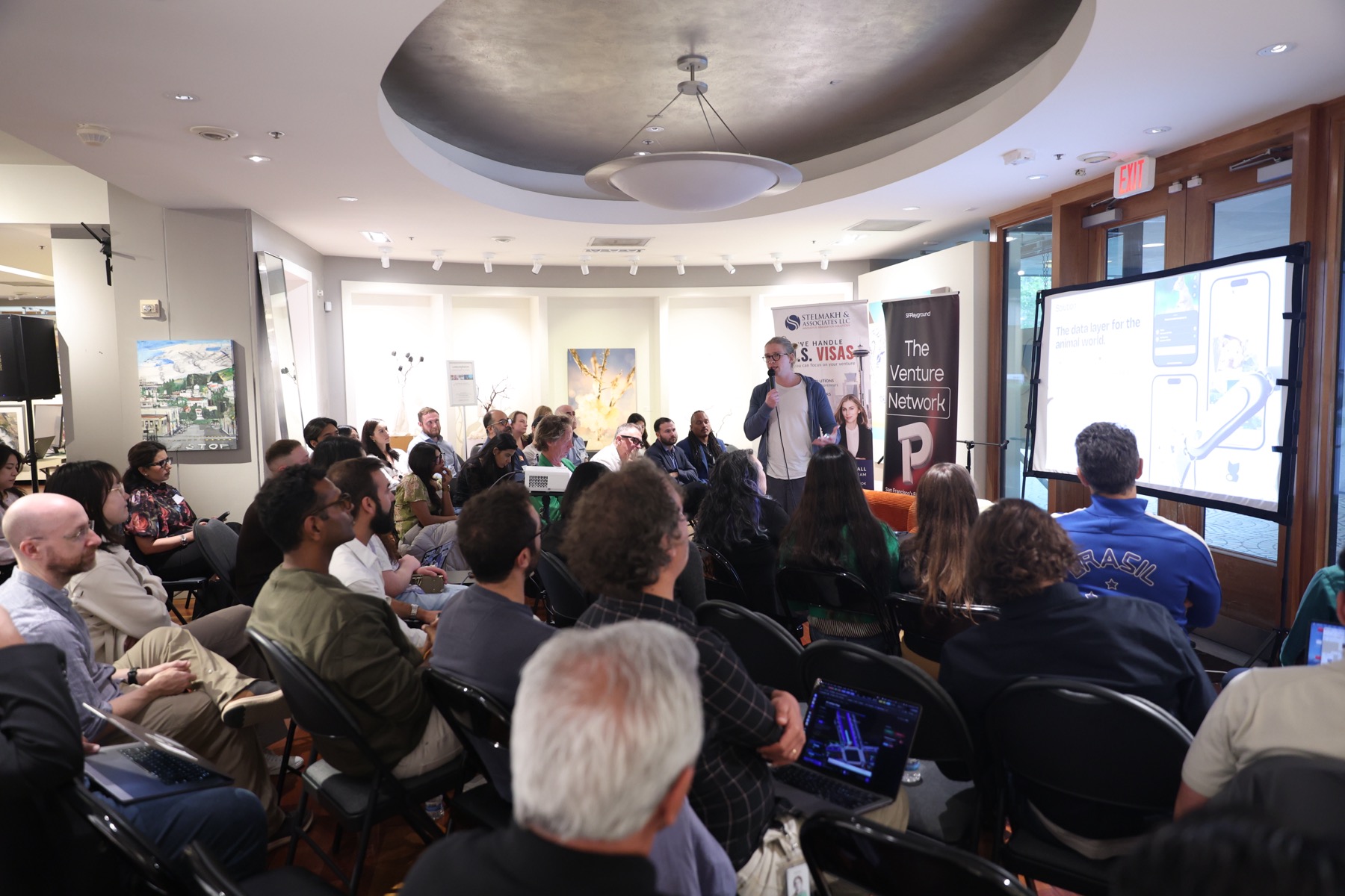 Founder presenting during Immigrant Founders Pitch Night