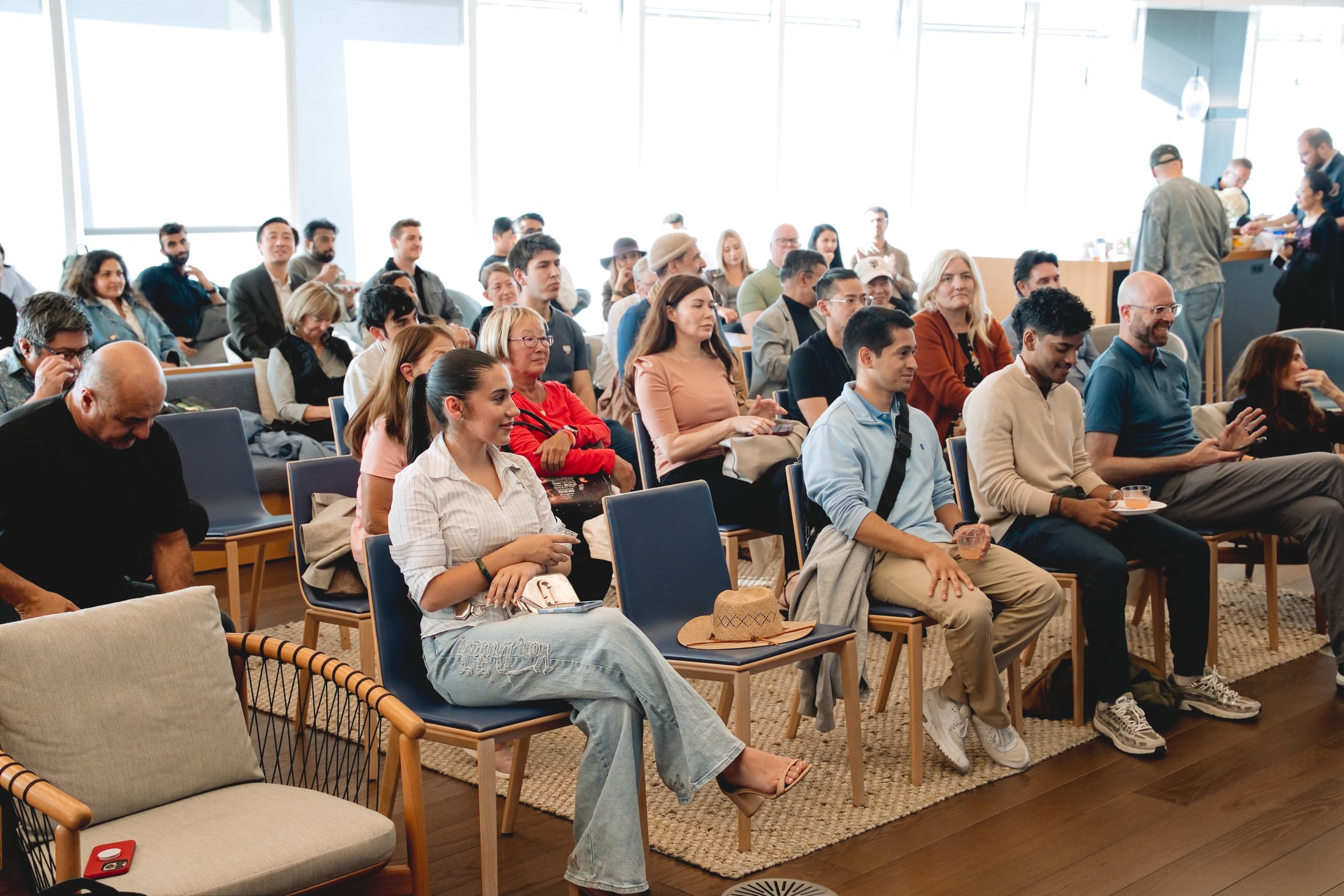 Audience seated at a Salesforce Tower venture summit